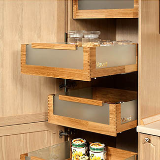 A storage cabinet with drawers behind the facade, the opening angle of which is 155 °